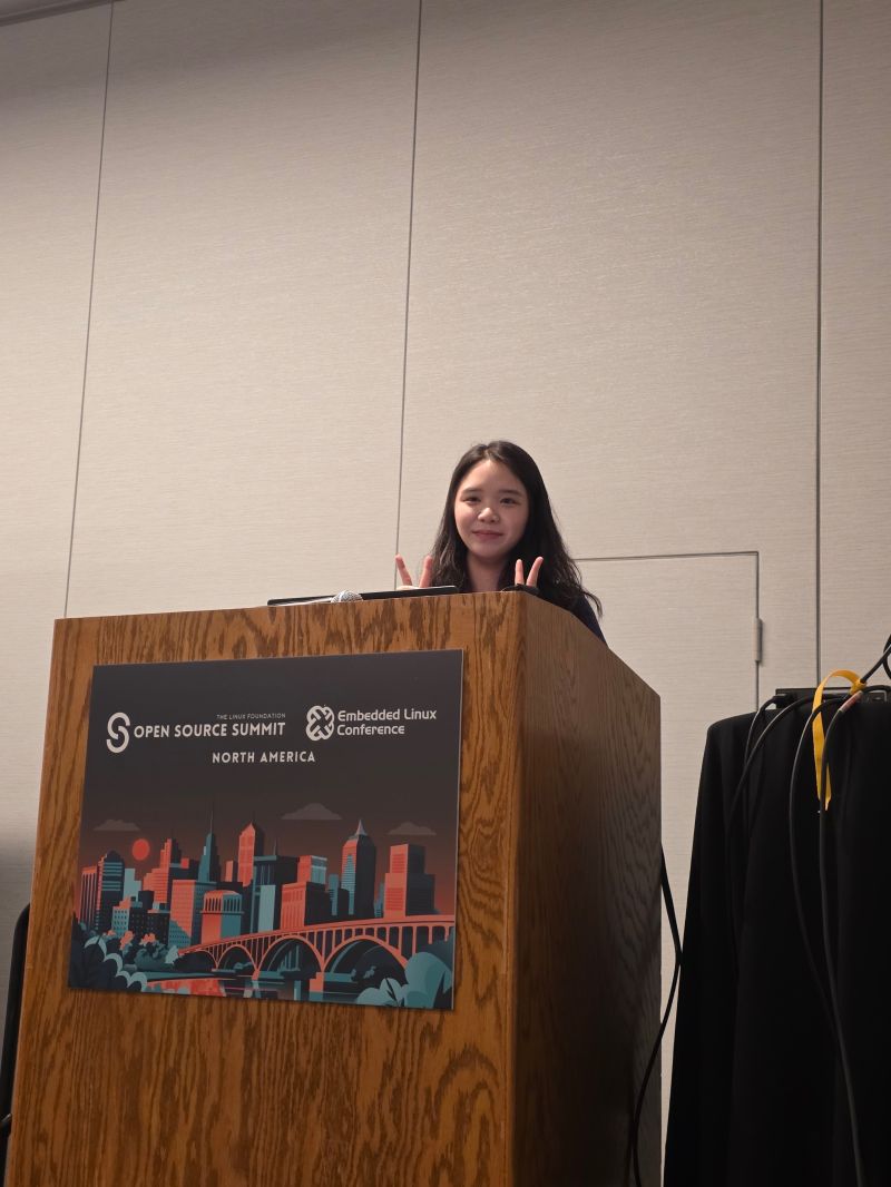 Delivering the session from the conference podium